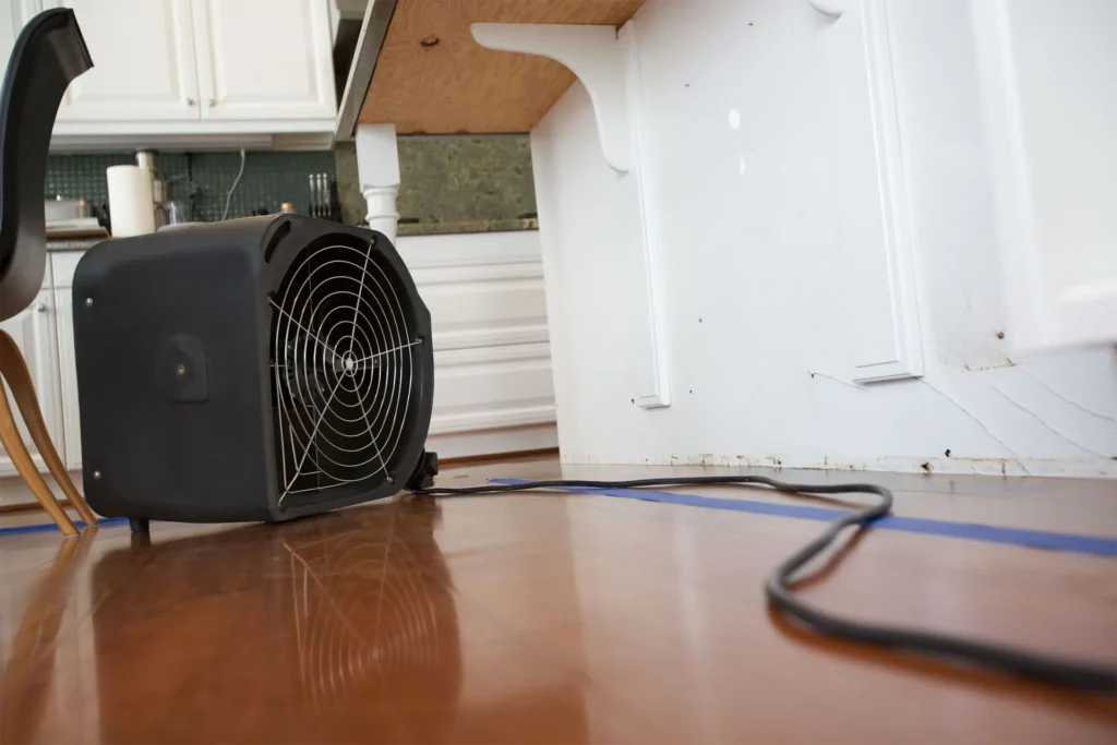 water-damaged floor with drying equipment