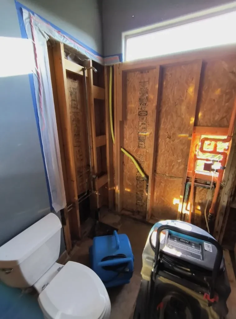 bathroom receiving water damage restoration