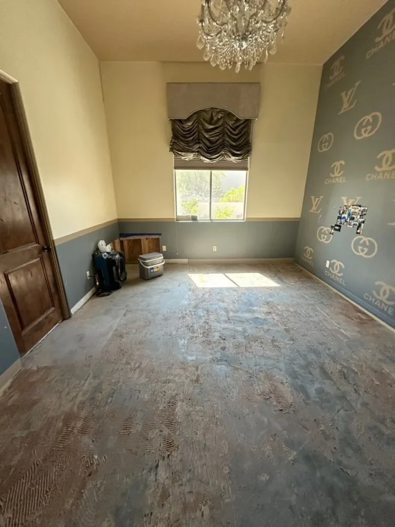 bedroom with flooring removed after water damage